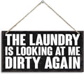 Humor Laundry Room Decor Sign, The Laundry is Looking at Me Dirty Again, Funny Bathroom Sign Wall Decor, Washing Room Decoration with Rope Hanging 12 x 6 Inches