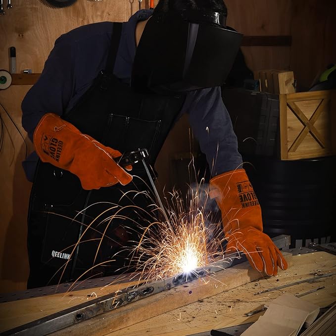 QeeLink Leather Welding Work Apron with 6 Tool Pockets, Heat & Flame Resistant Welder Aprons, 24" x 36", Adjustable M to XXXL