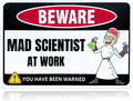 Mad Scientist at Work Desk Decor Tin Sign - Laboratory Posters for Wall - Metal Wall Decor - Science Gifts for Adults - Funny Science Classroom Decor - Party Decorations